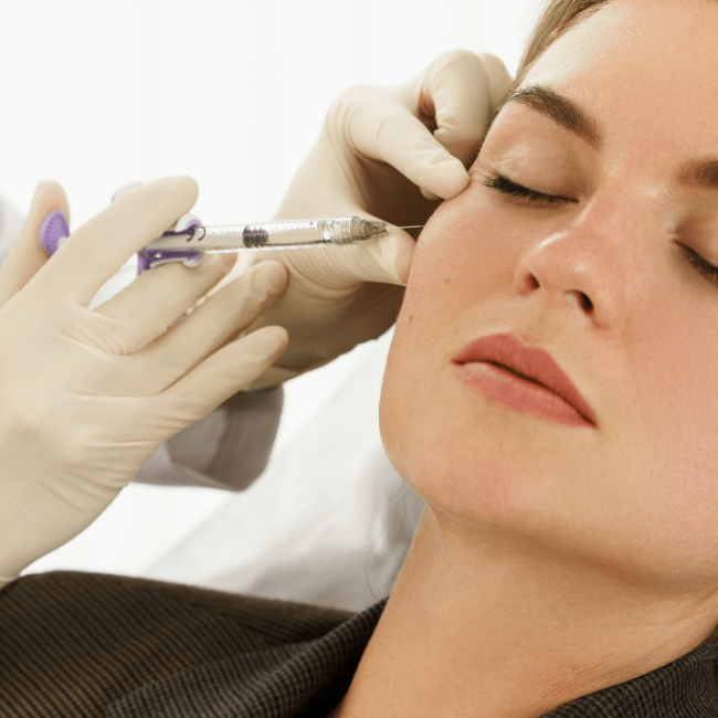 Woman getting dermal fillers